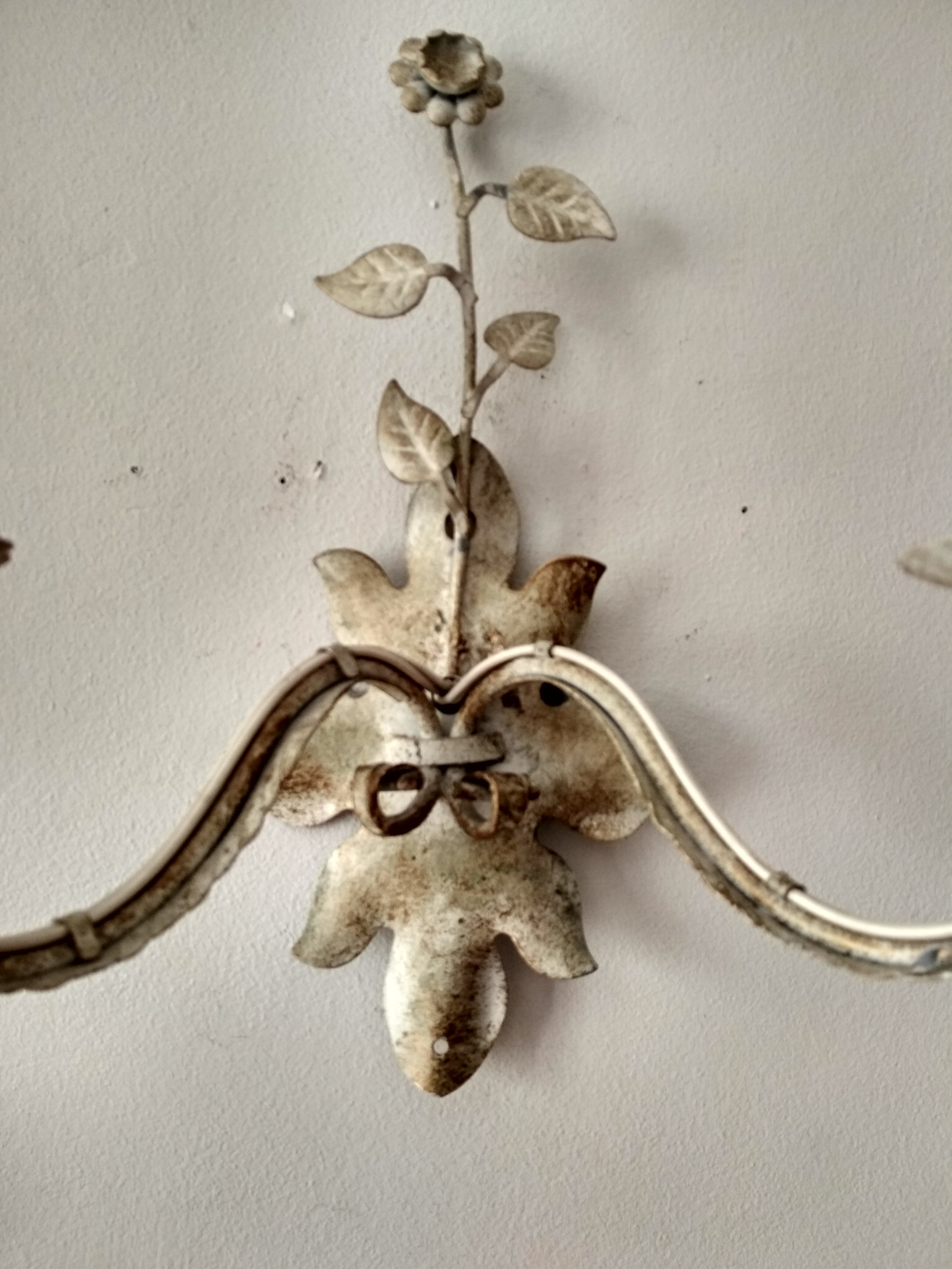 White glazed metal wall light with leaf and flower decor, 2 lights