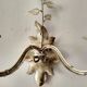 White glazed metal wall light with leaf and flower decor, 2 lights