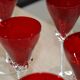 5 red crystal glasses with twisted stems