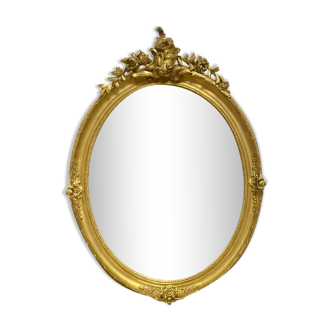 Miroir oval en bois doré 70x49cm