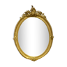 Oval mirror in gilded wood 70x49cm
