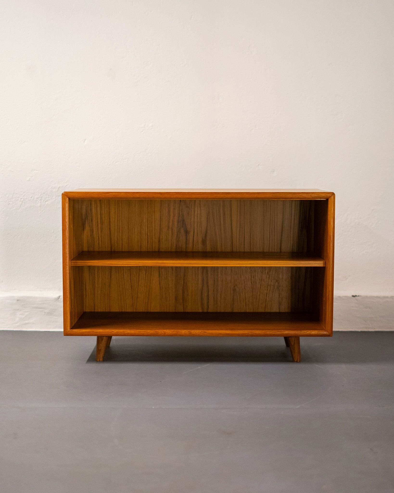 Mid-century low shelf in teak