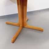 Vintage round table from the 60s and 70s in blond elm with integrated extension