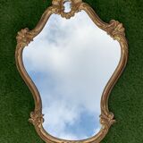 Old mirror in carved wood and gilded leaf, Louis XV rocaille style, twentieth century 59x87cm
