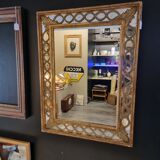 Mirror with parecloses