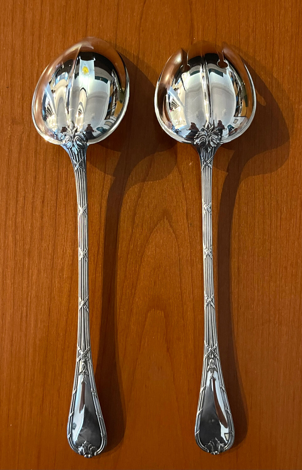 Christofle ribbon and bell-shaped salad serving pieces, very beautiful and