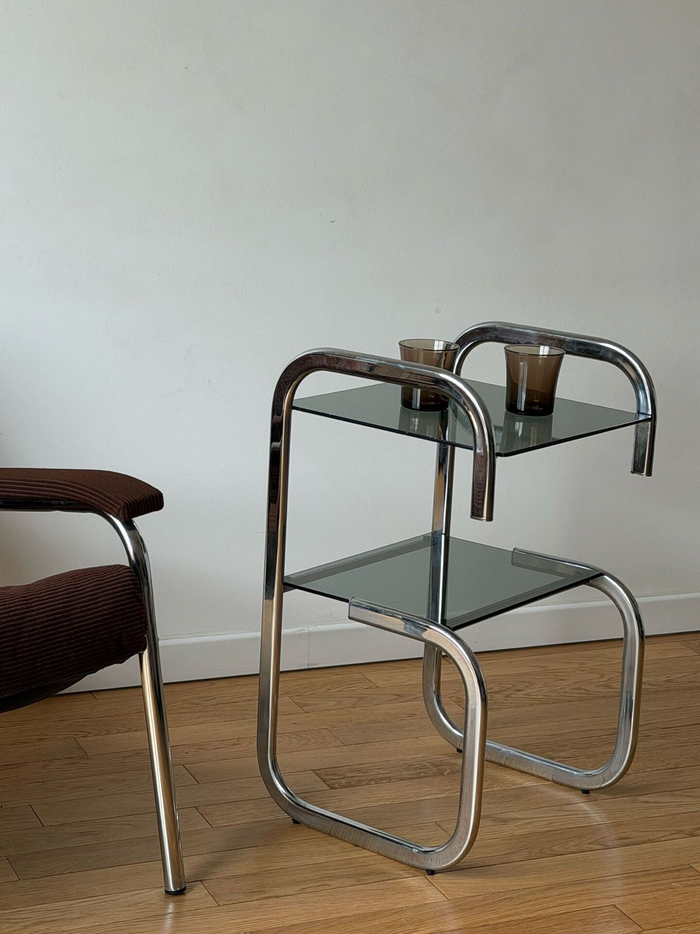 Vintage side table in smoked glass and chrome