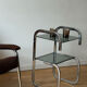 Vintage side table in smoked glass and chrome