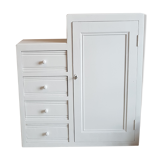 Old white asymmetrical chest of drawers