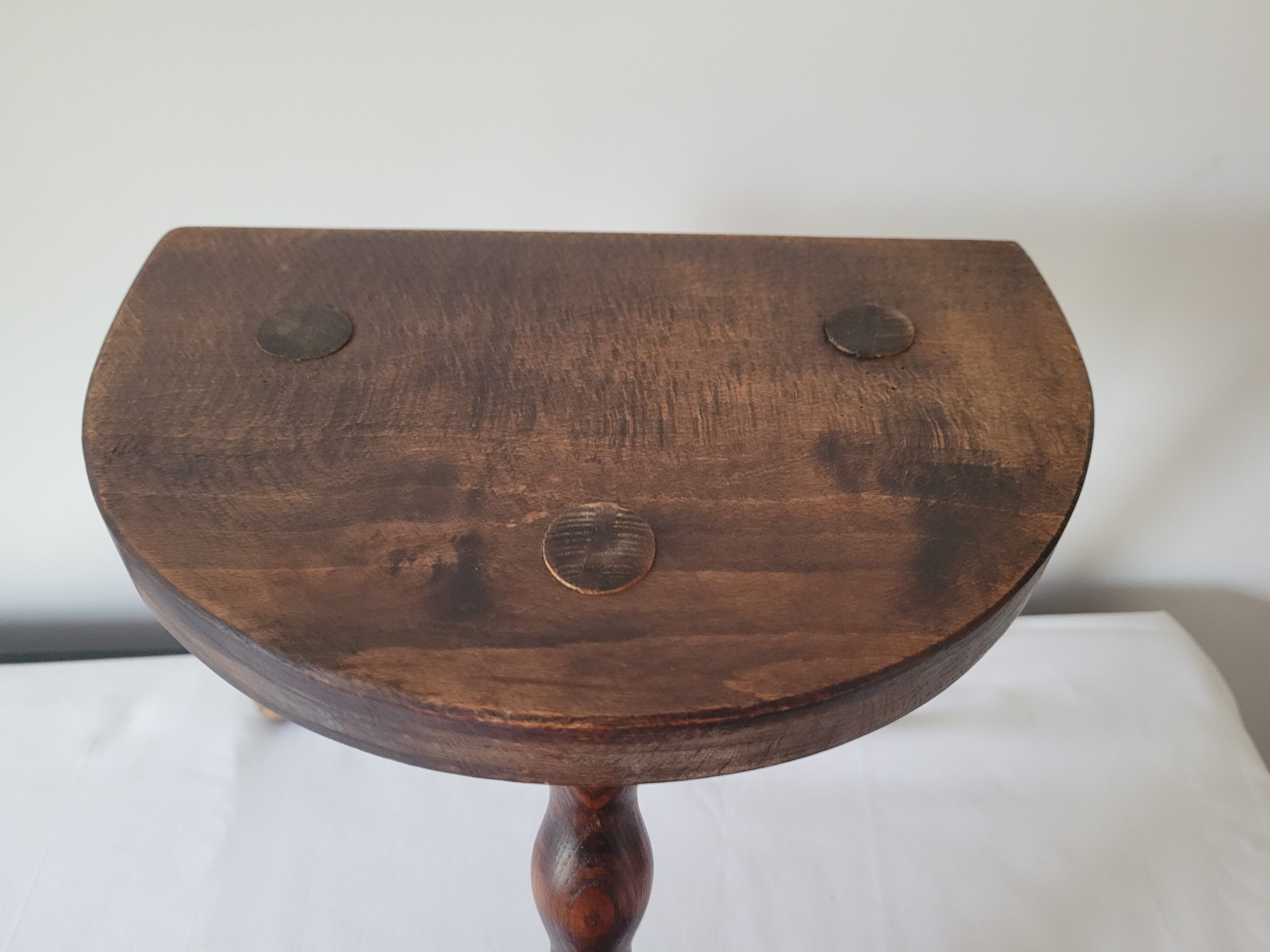 Tripod stool with turned wooden legs