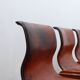 Curved wooden and leather chairs by Afra and Tobia Scarpa from the 1970s, set of 4.