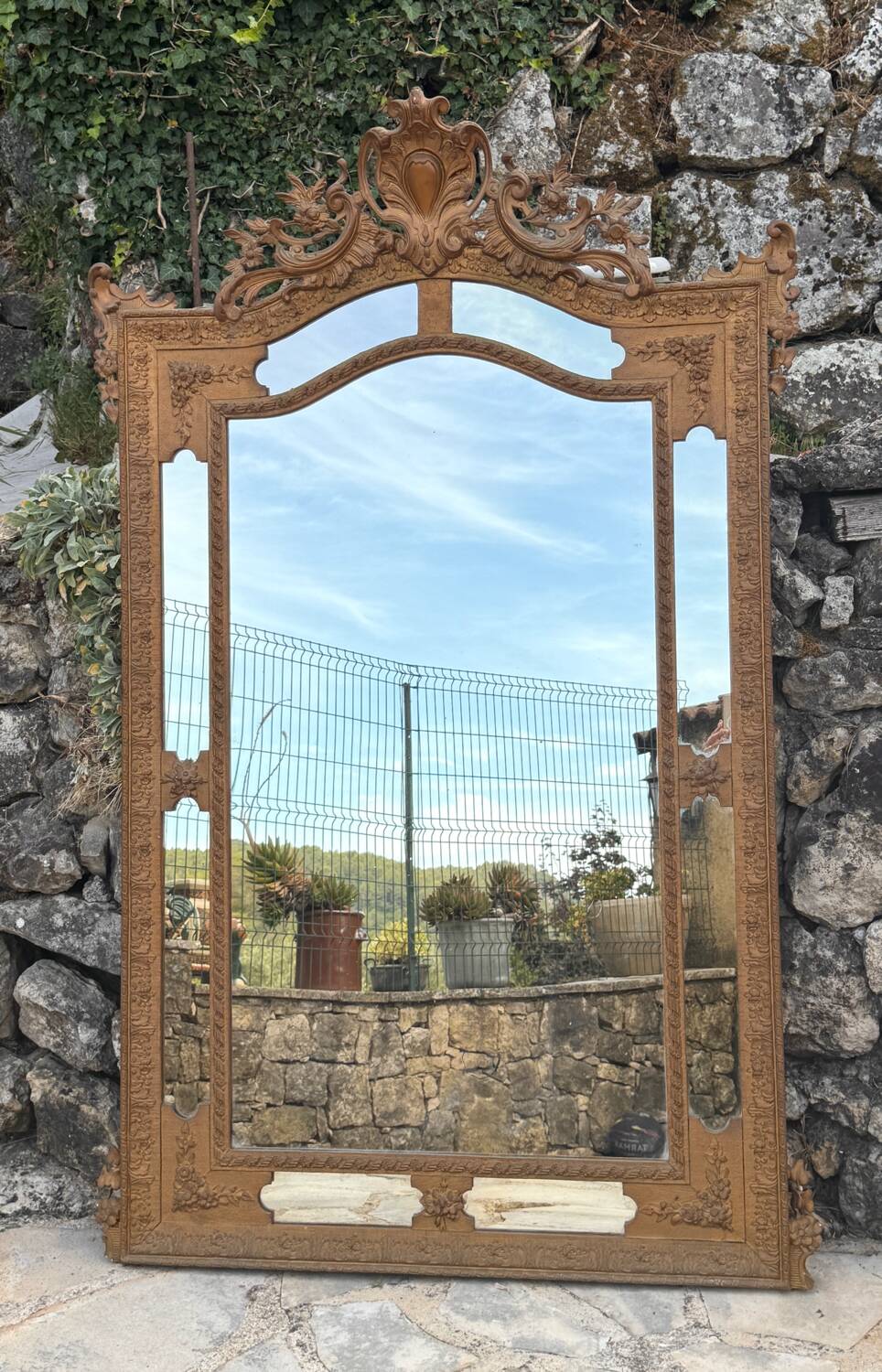 Mirror in gilded wood and stucco, with glazing beads, Napoleon III period.