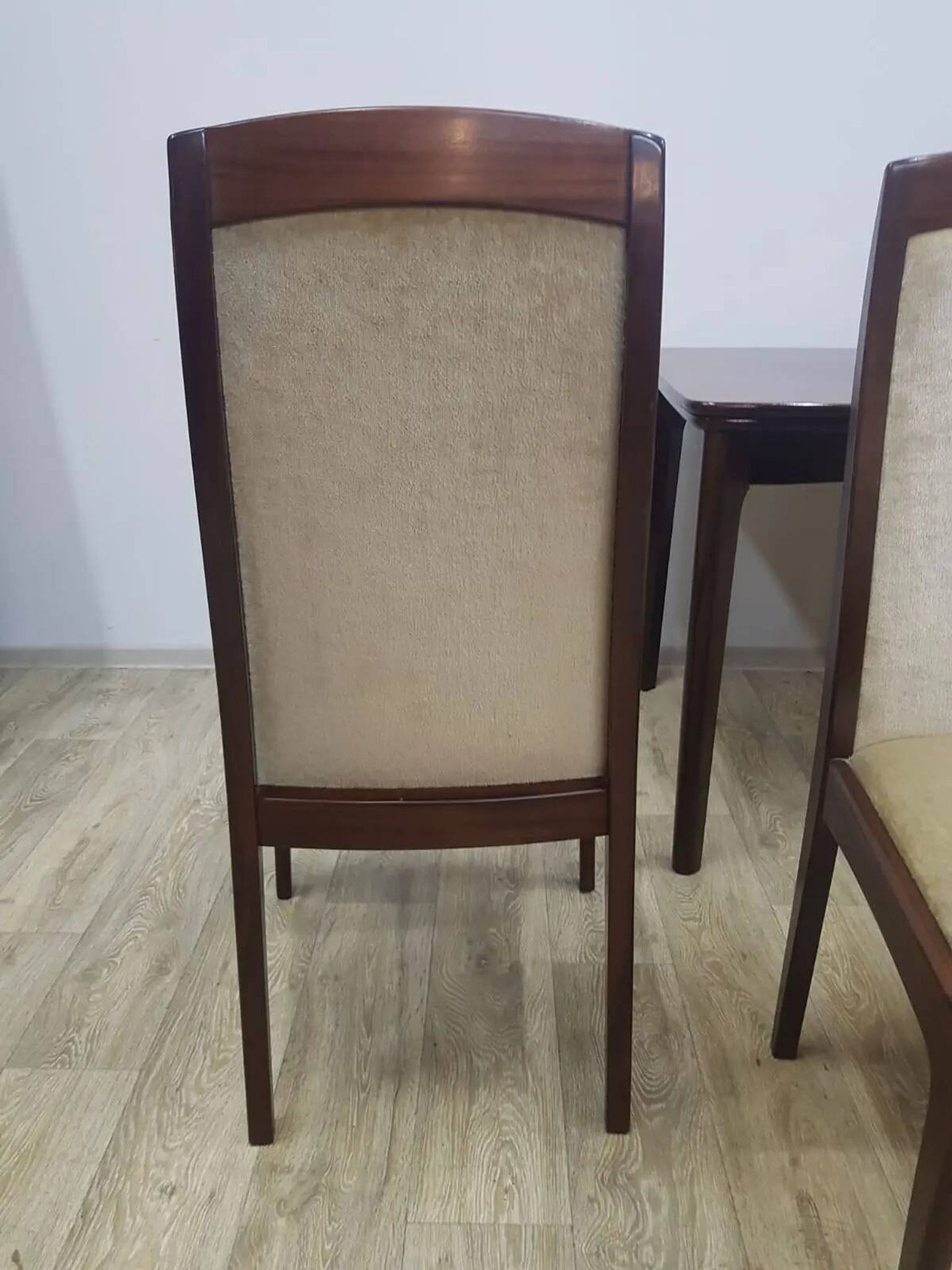 Table and four chairs set, brown wood, beige fabric, Denmark, 1970s.