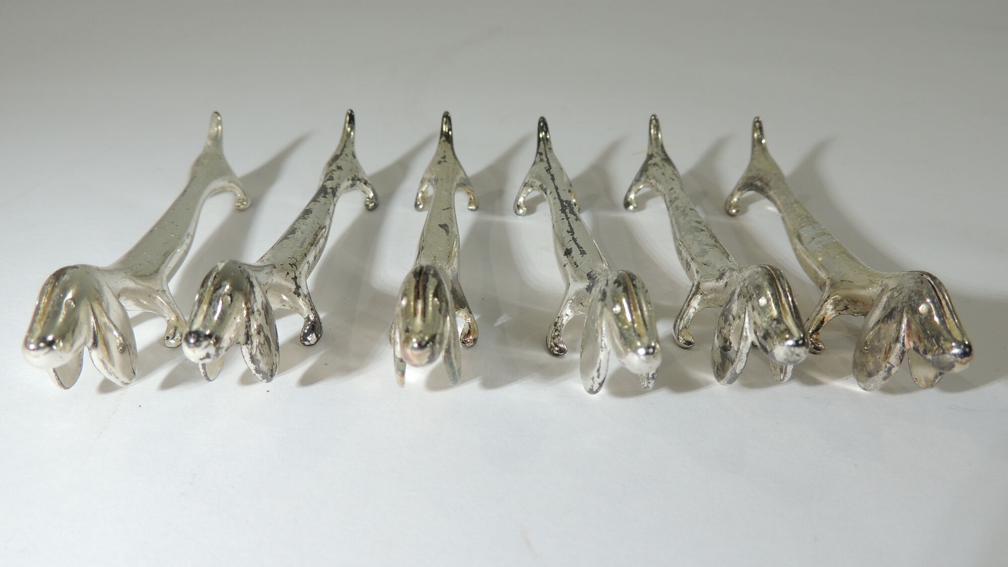 Lot 17 porte couteaux métal /chien /cheveaux/vintage