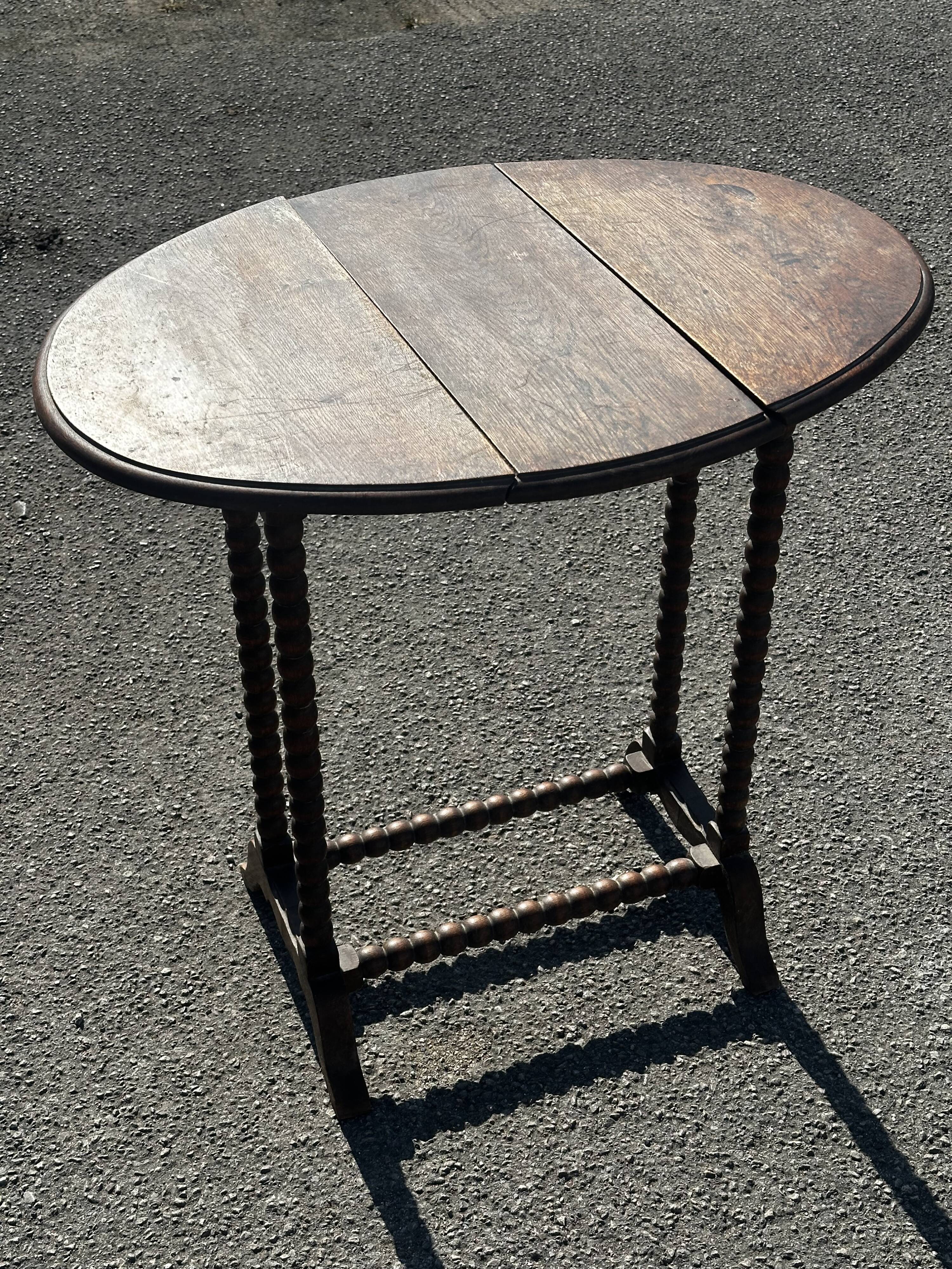Small folding table called Gateleg, Victorian era