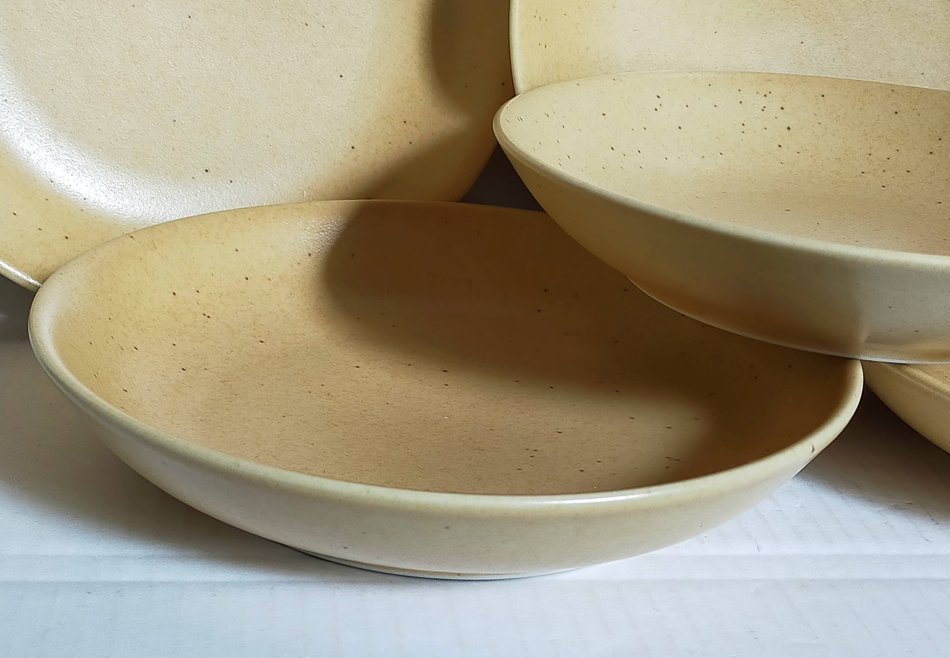 Five vintage natural stoneware soup plates