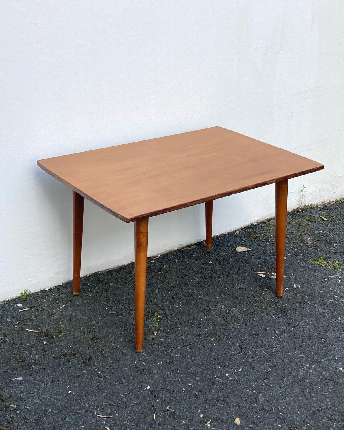 Wooden coffee table with compass leg