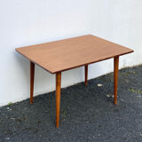 Wooden coffee table with compass leg