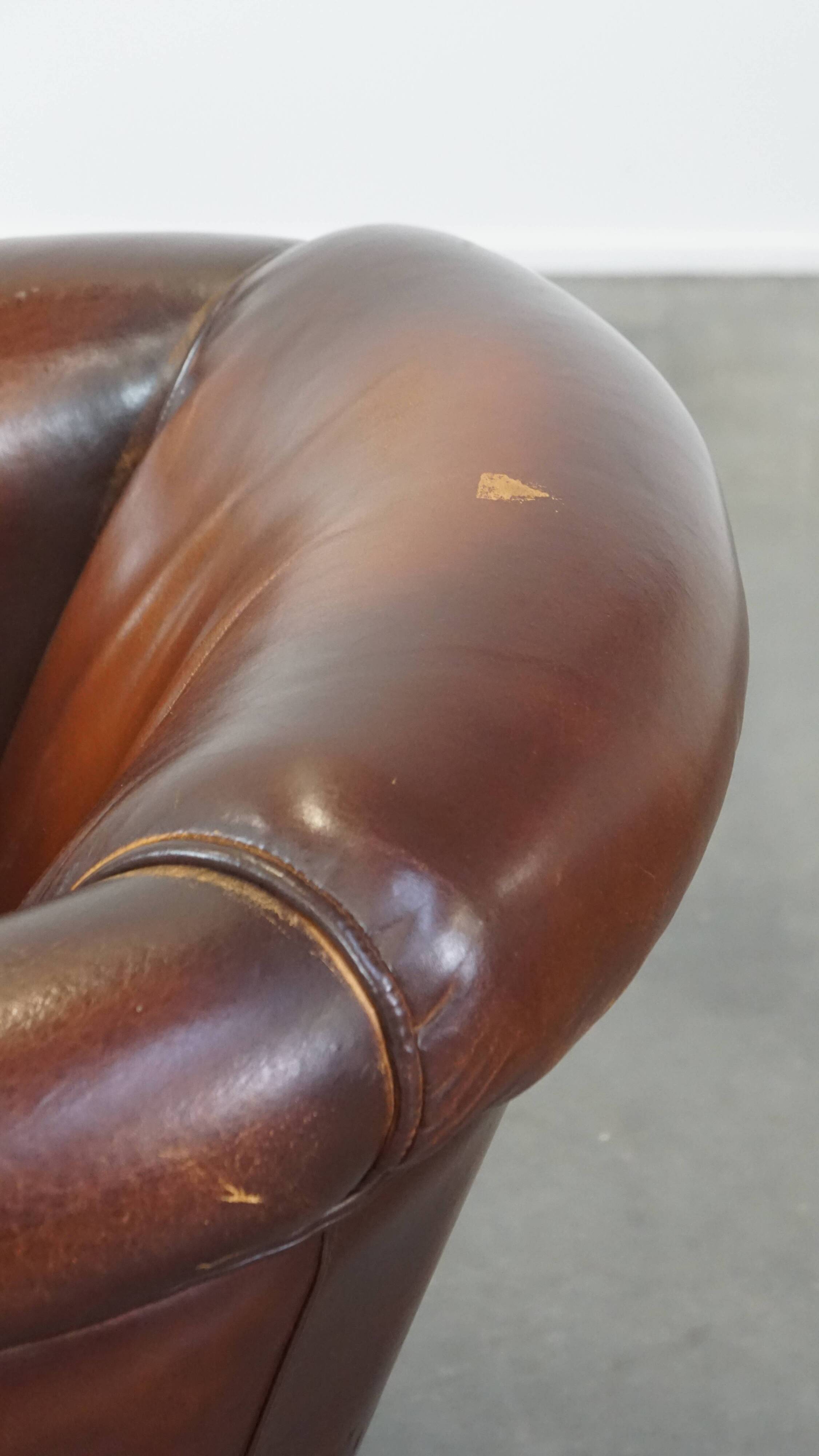 Vintage club armchair made of sheep leather