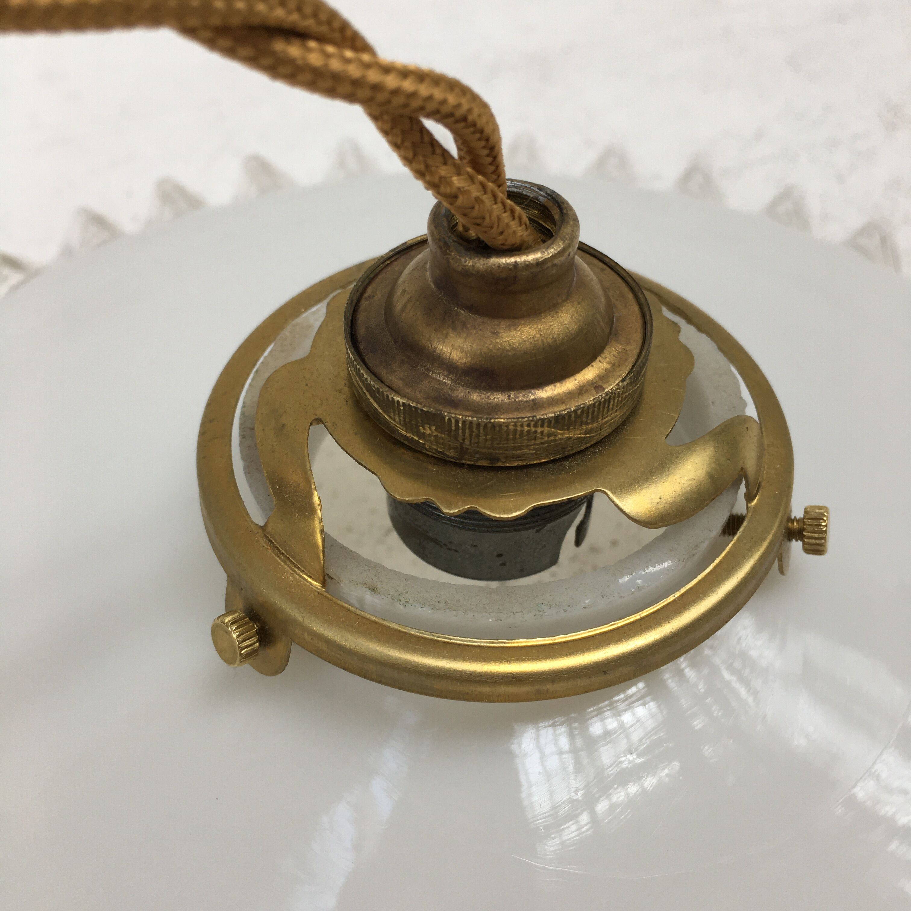 Pair of white opaline suspensions with serrated edges