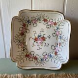 Old hollow porcelain dish with floral decoration and gold trim