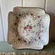 Old hollow porcelain dish with floral decoration and gold trim