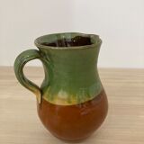 Green and brown ceramic pitcher
