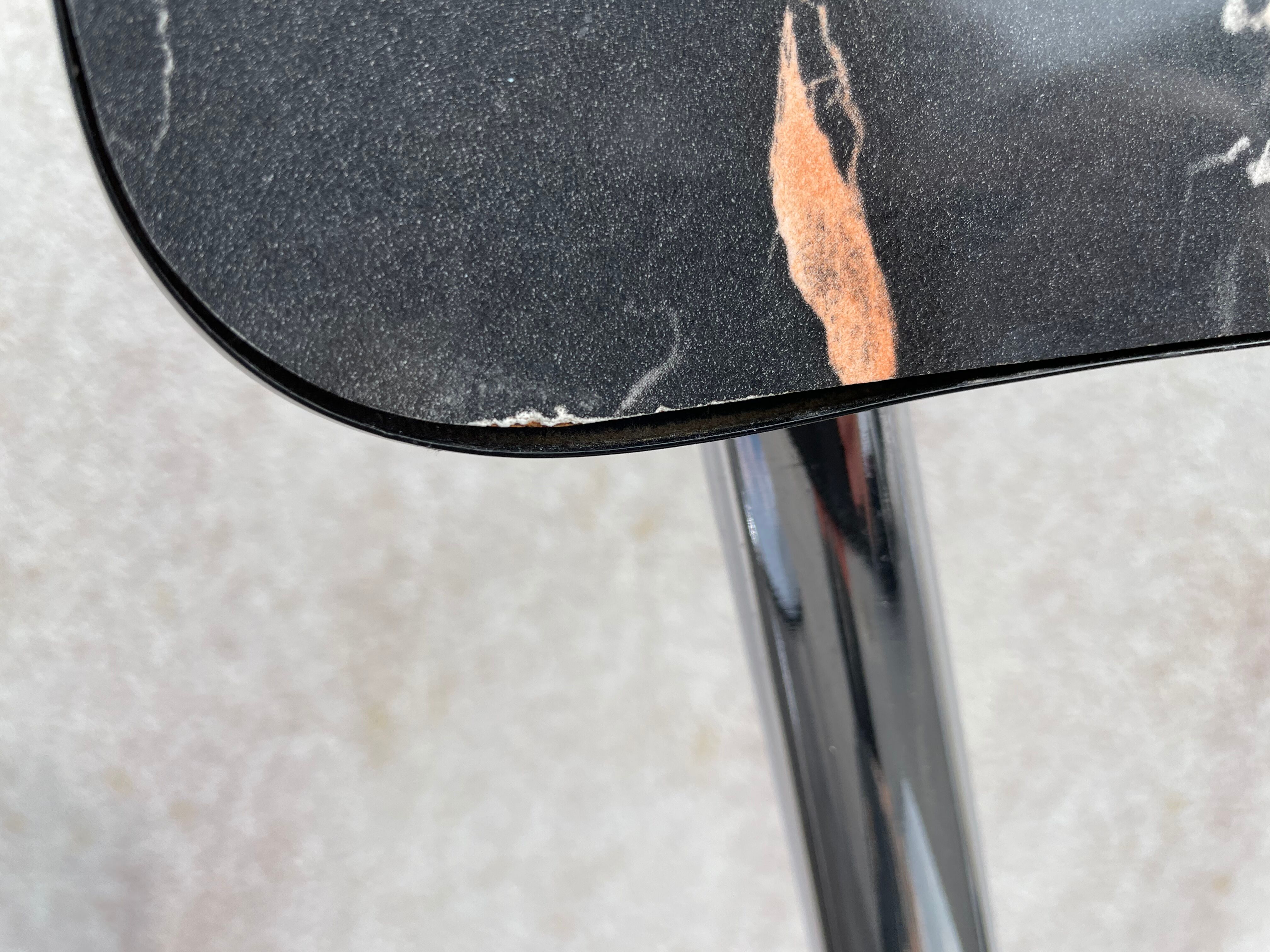 Black marbled formica chairs