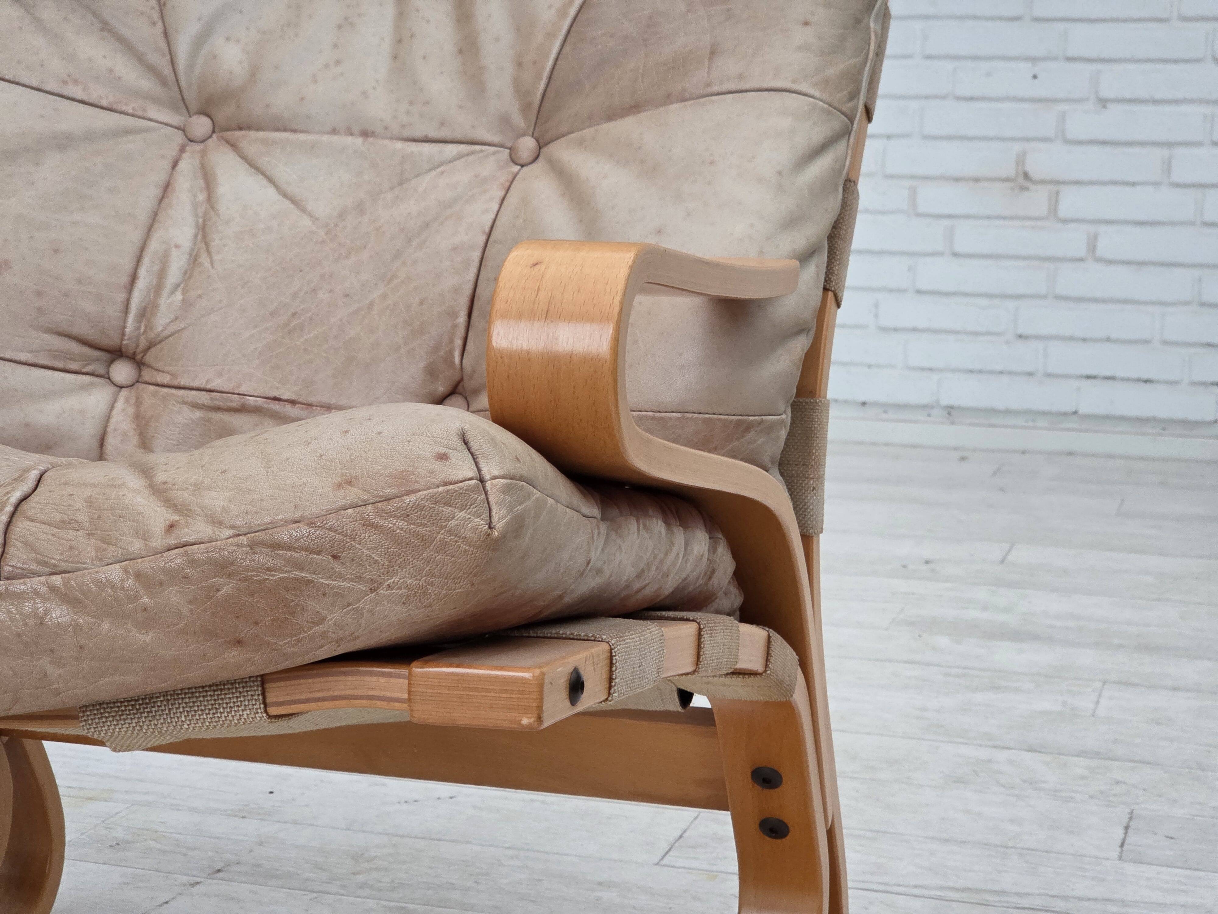 1970s, Norwegian armchair, model "Kengu", beige furniture leather.