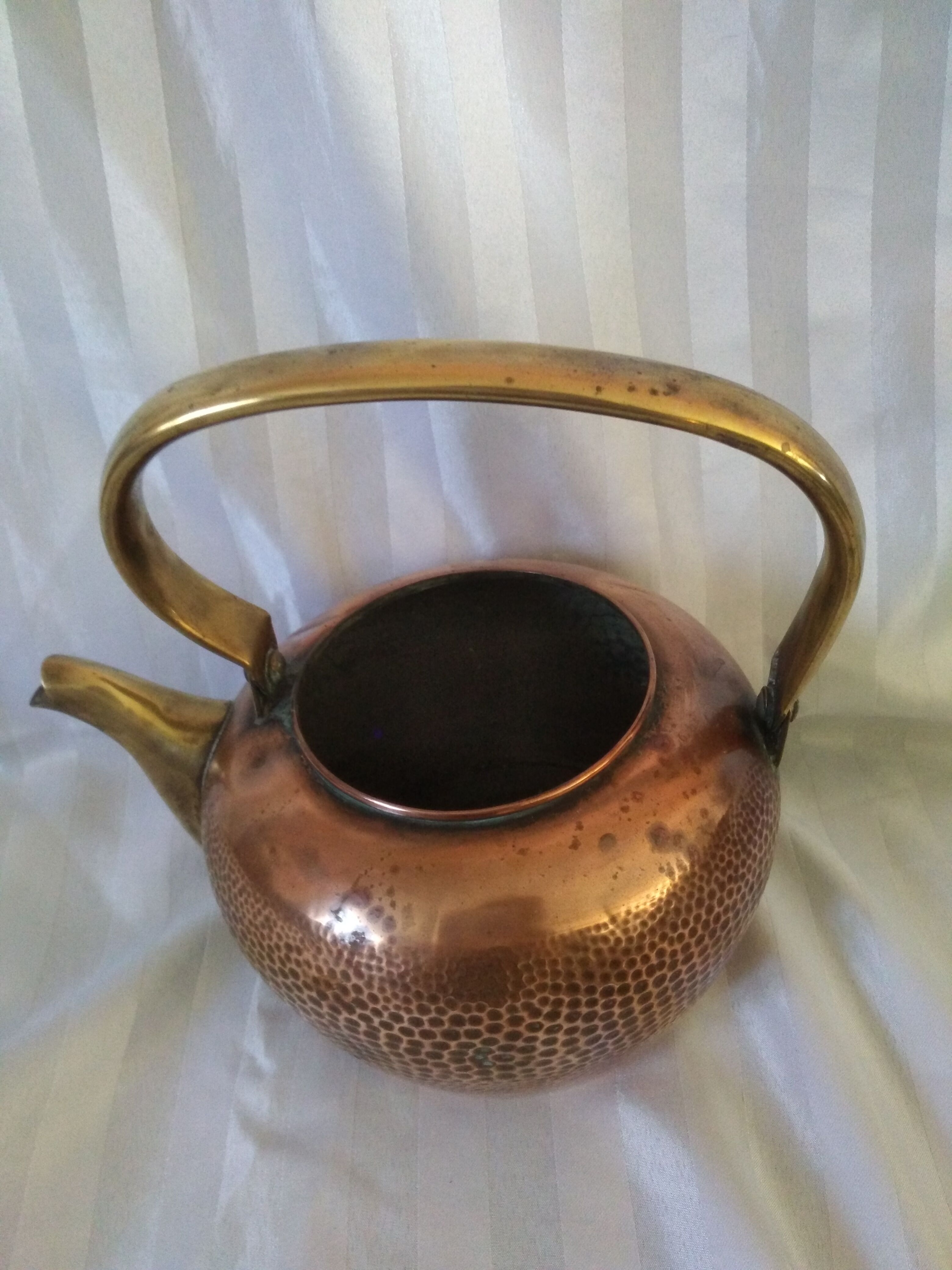 Old kettle red copper and brass
