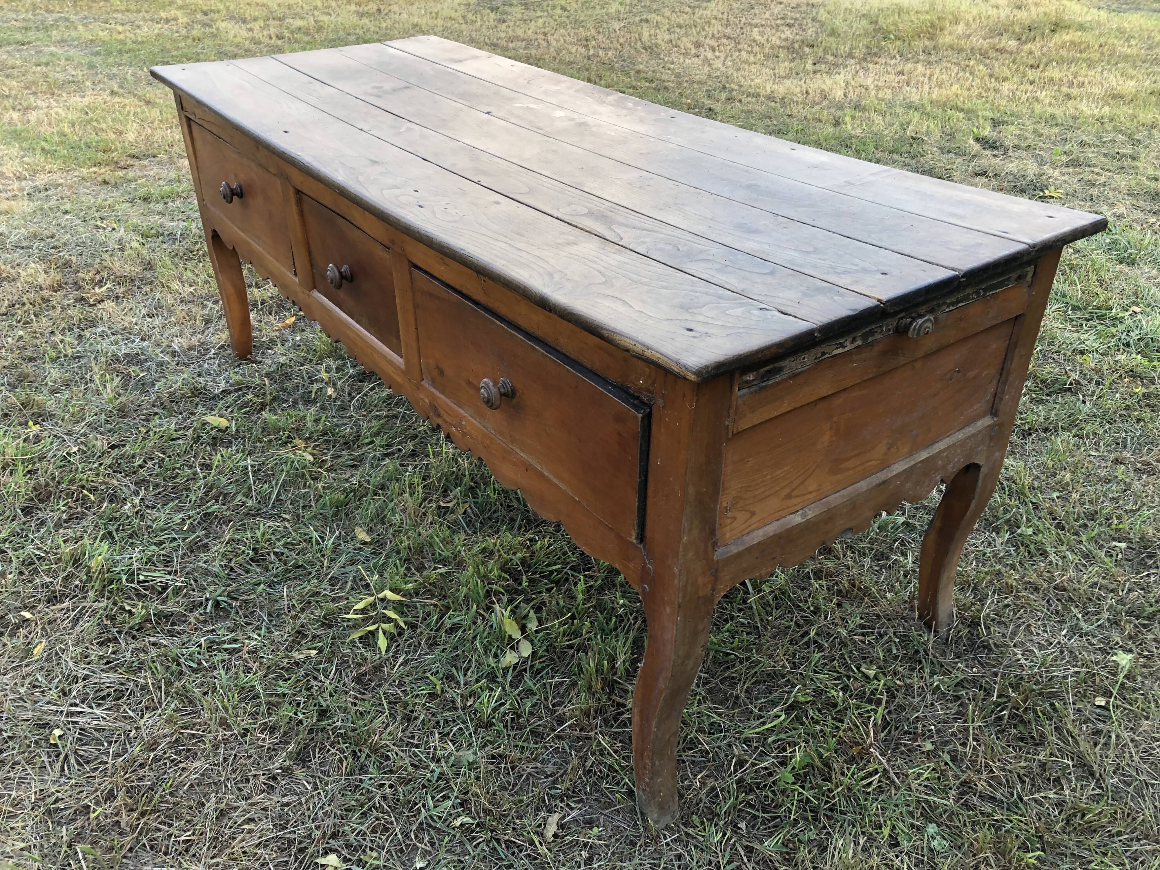 Antique Louis XV paneled table with 3 front drawers in solid cherry wood