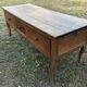 Antique Louis XV paneled table with 3 front drawers in solid cherry wood