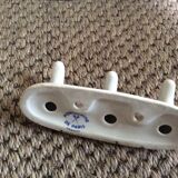 Set of hooks and soap holder
