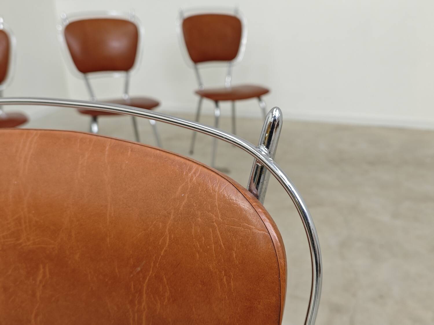 Set of 4 French chairs in camel brown imitation leather and chrome 1960