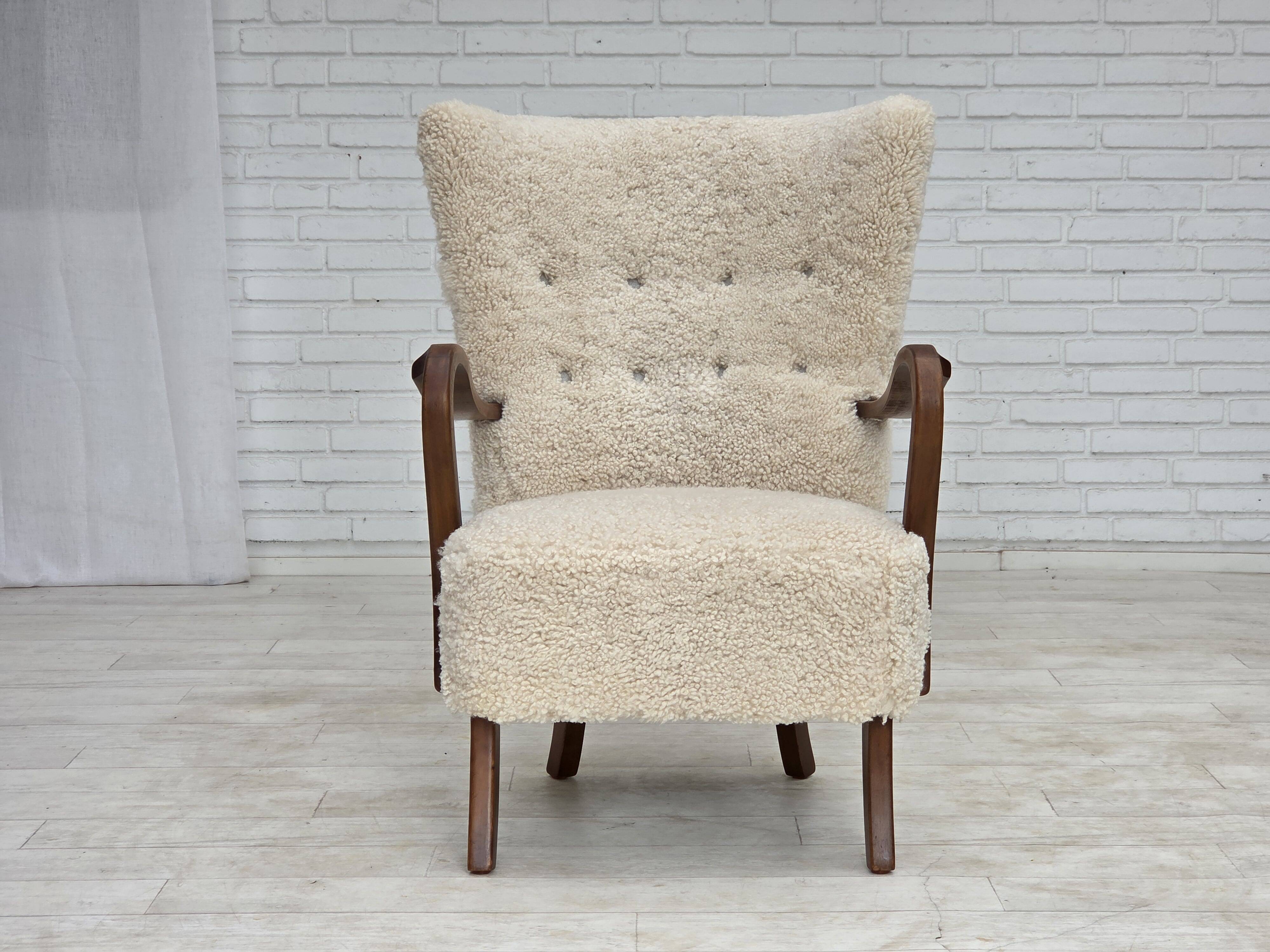 1960s, Danish design by Alfred Christensen, reupholstered, sheepskin.