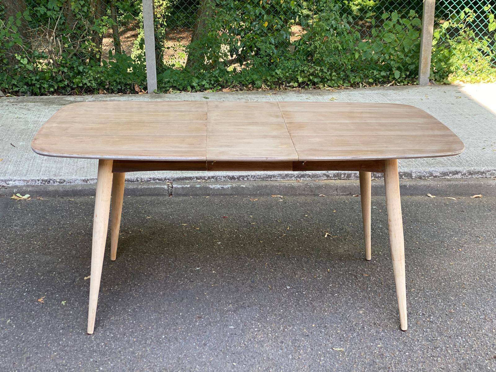 Renovated Scandinavian extendable dining table in teak and veneer from 1980.