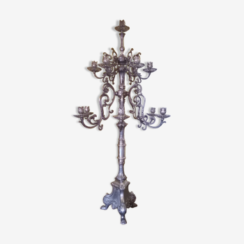 Old bronze and silver candlestick massif