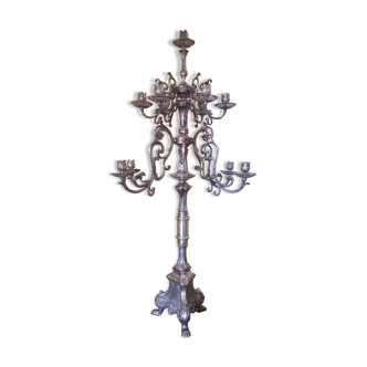 Old bronze and silver candlestick massif