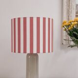 Sandstone lamp and striped lampshade