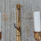 Pair of Louis XVI Style Bronze Wall Lights Forming Knots and Flowers