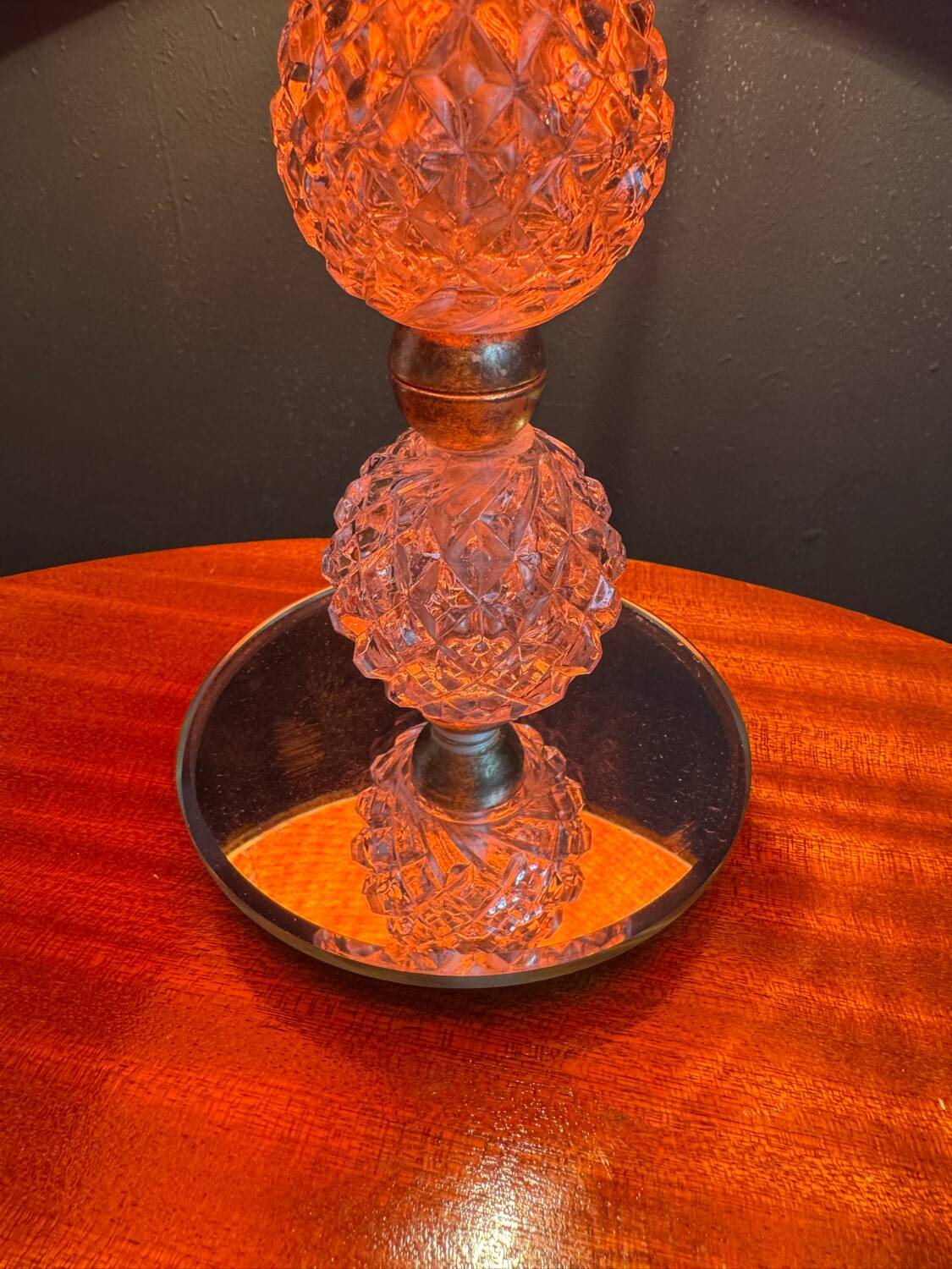 Small glass, mirror, and brass lamp from the 1960s.