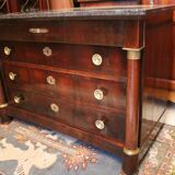 Commodity with mahogany detached columns and Empire gilded bronze ornaments