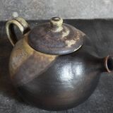 Vintage enameled stoneware potter's teapot