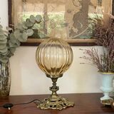 Bronze lamp and amber globe circa 1900