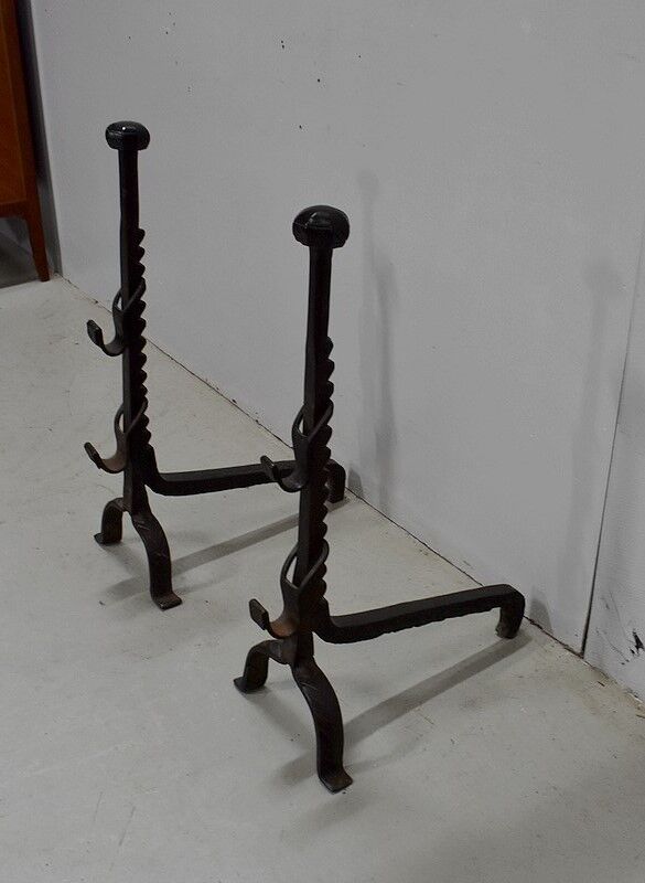 Pair of wrought iron chenets - late nineteenth century