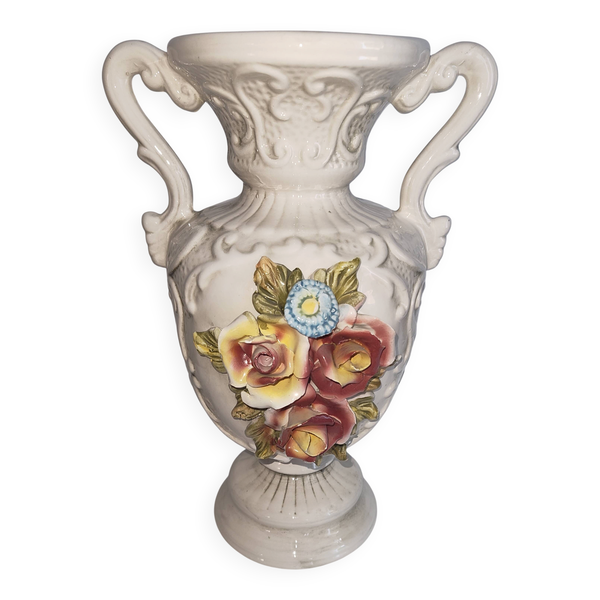 Vintage Italian white ceramic vase with raised floral decoration.