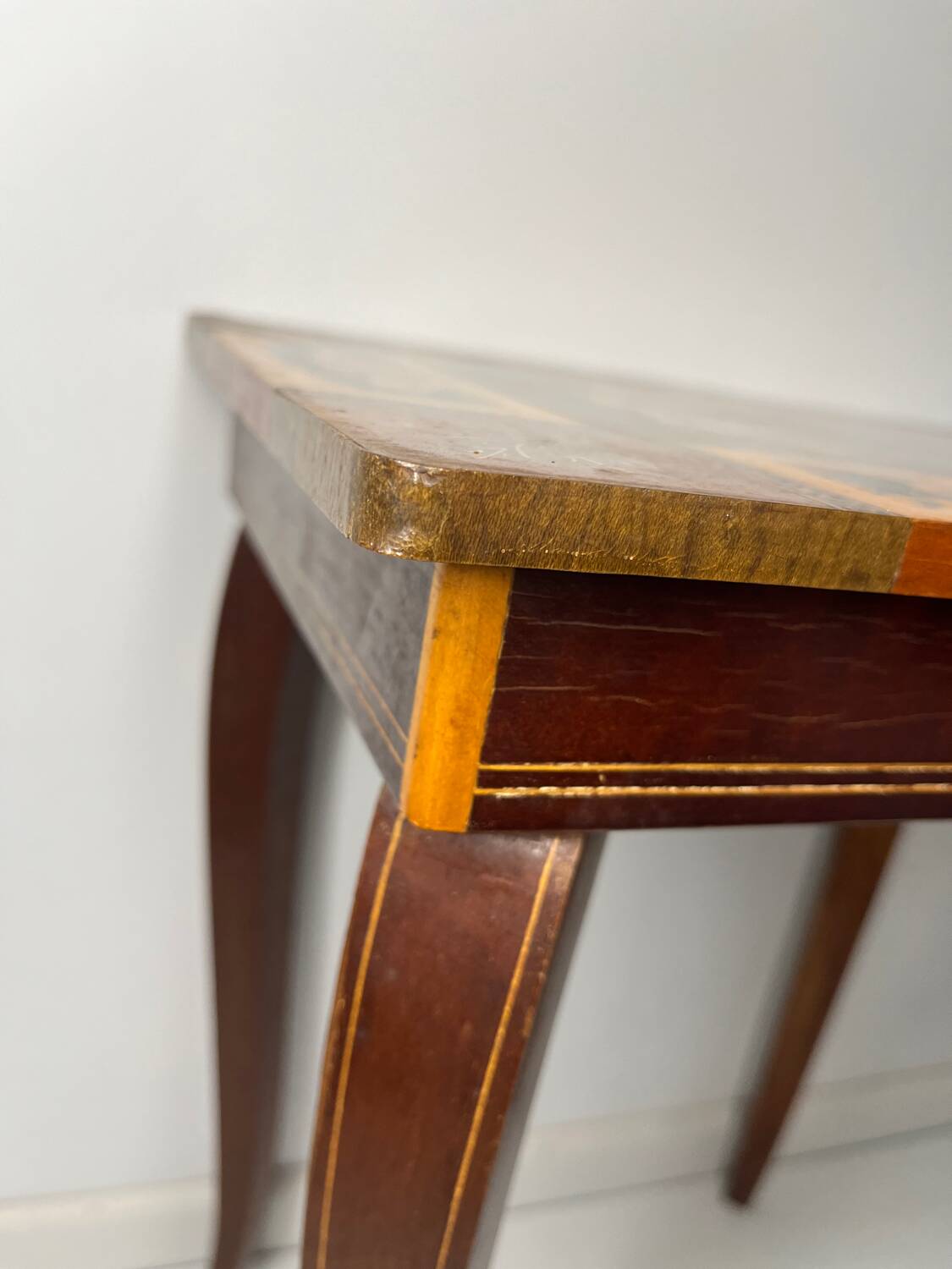 Small antique Italian inlaid table with Swiss music box.