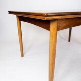 Dining table in rosewood with extensions of danish design from the 1960s