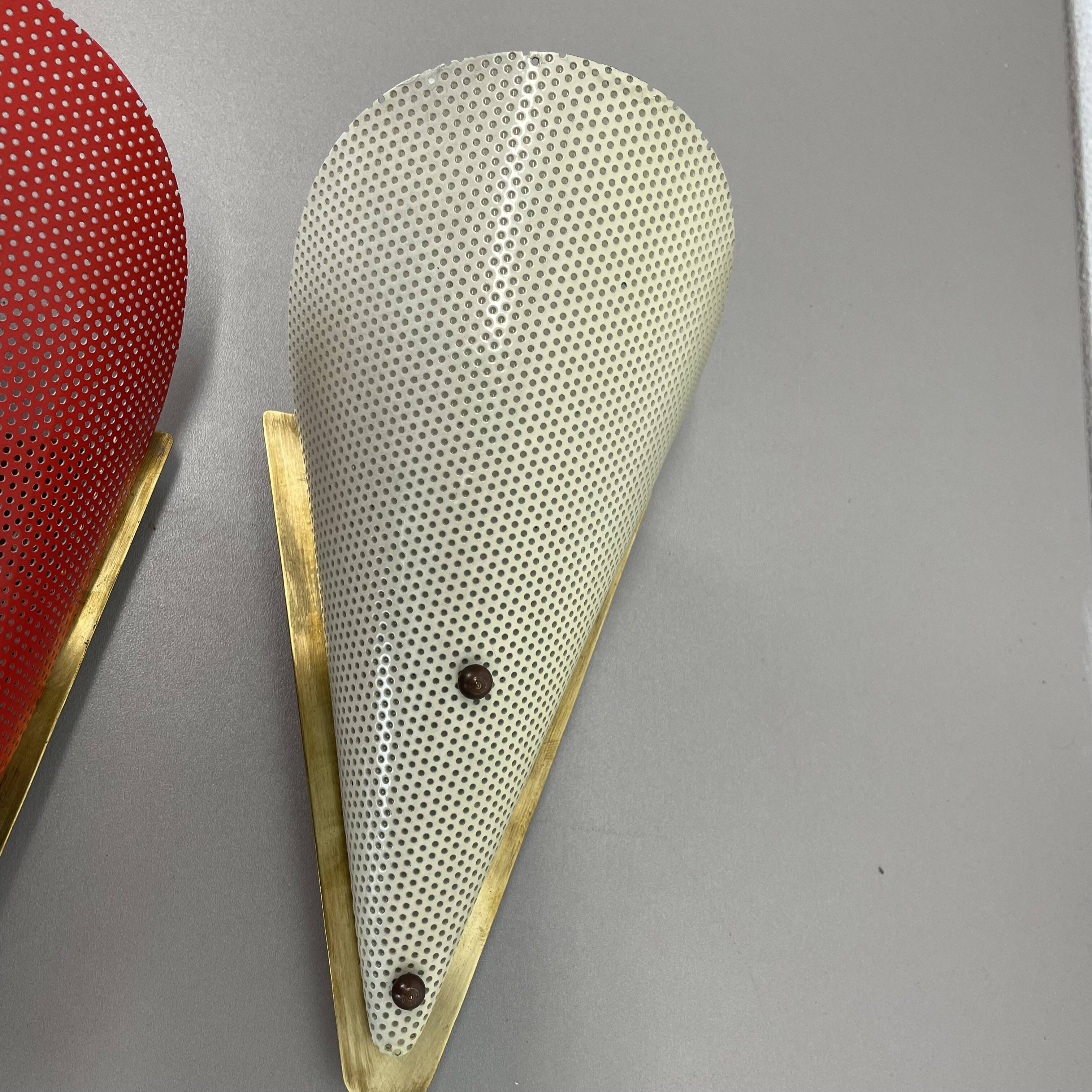 Set of two hole pattern theatre wall light sconces, france, 1950