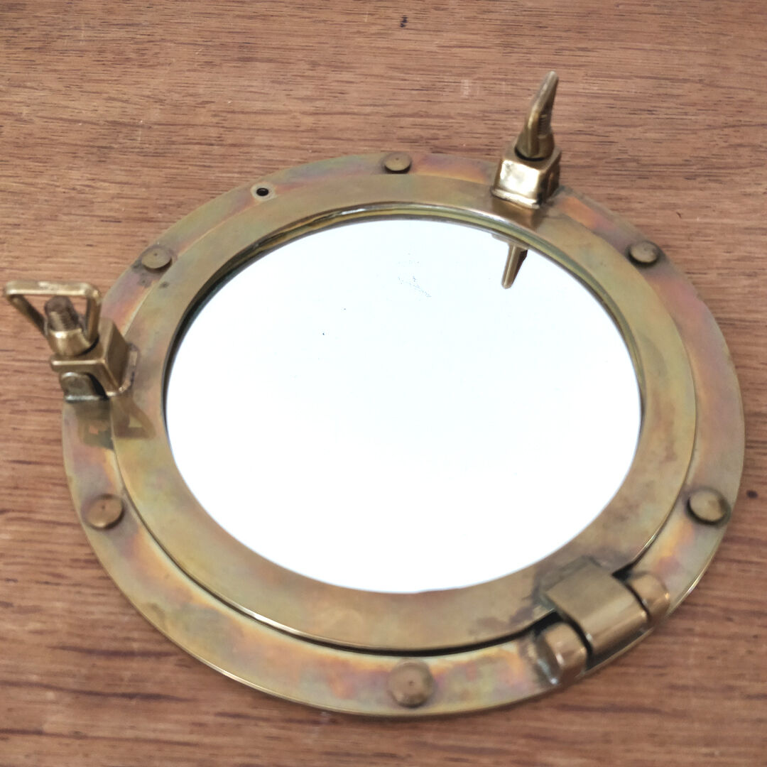 Brass window mirror 21cm diameter